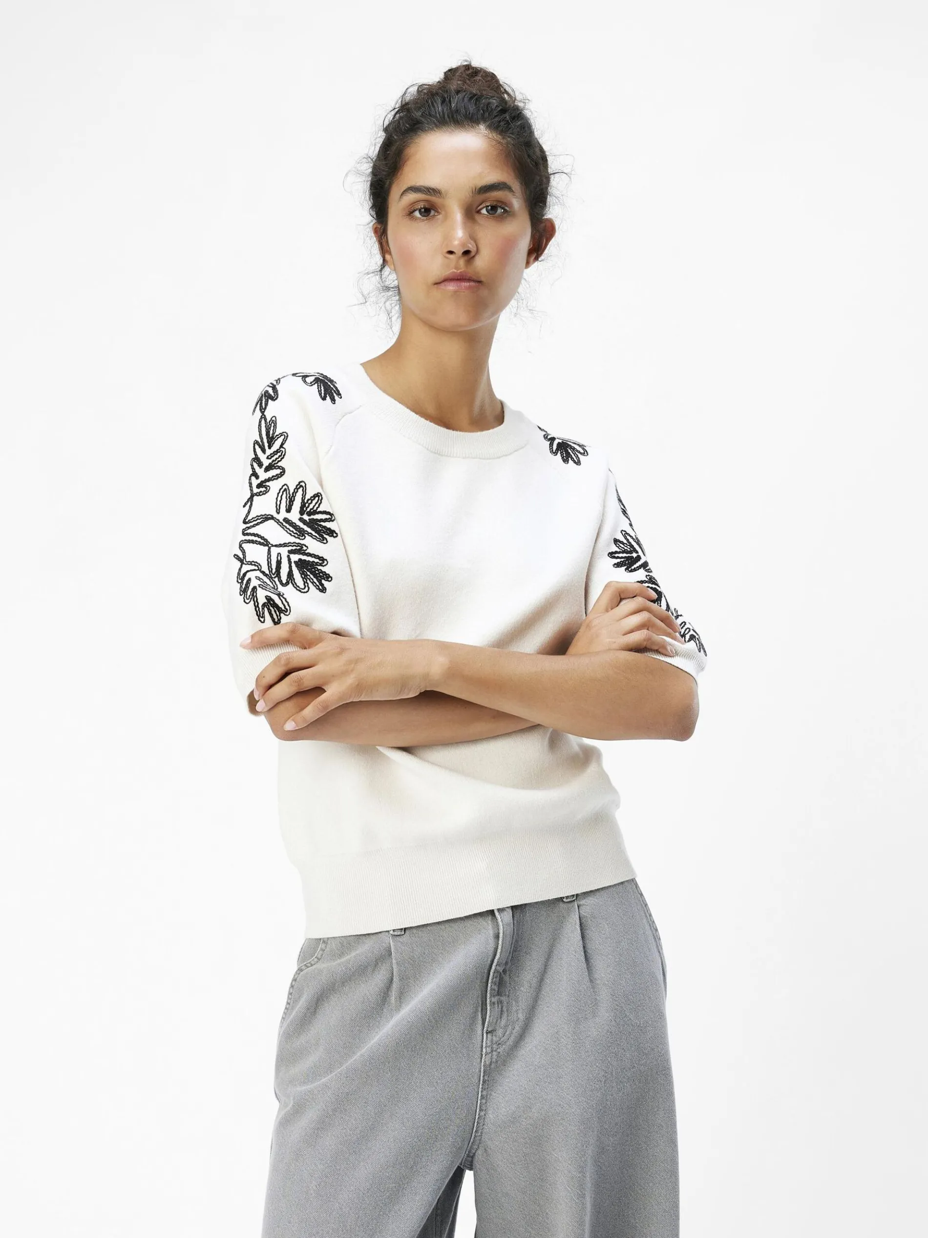 GEBORDUURD GEBREIDE TOP