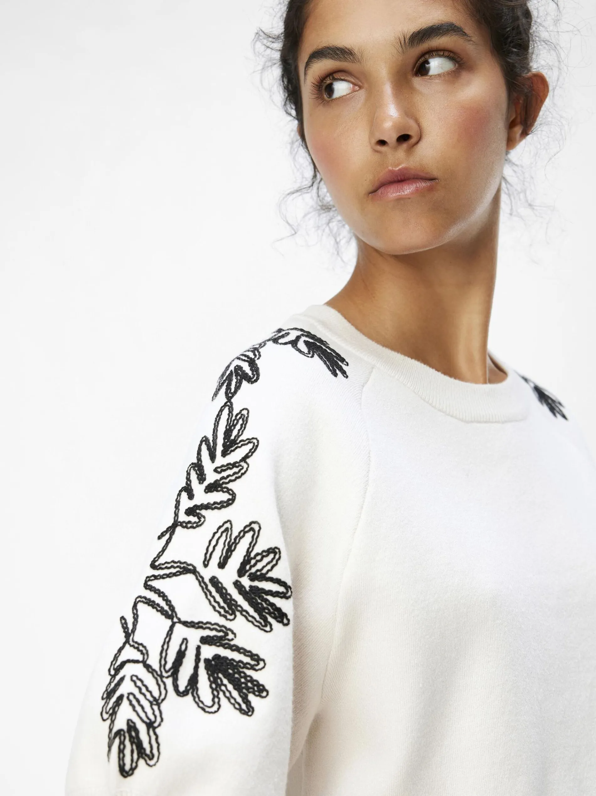 GEBORDUURD GEBREIDE TOP