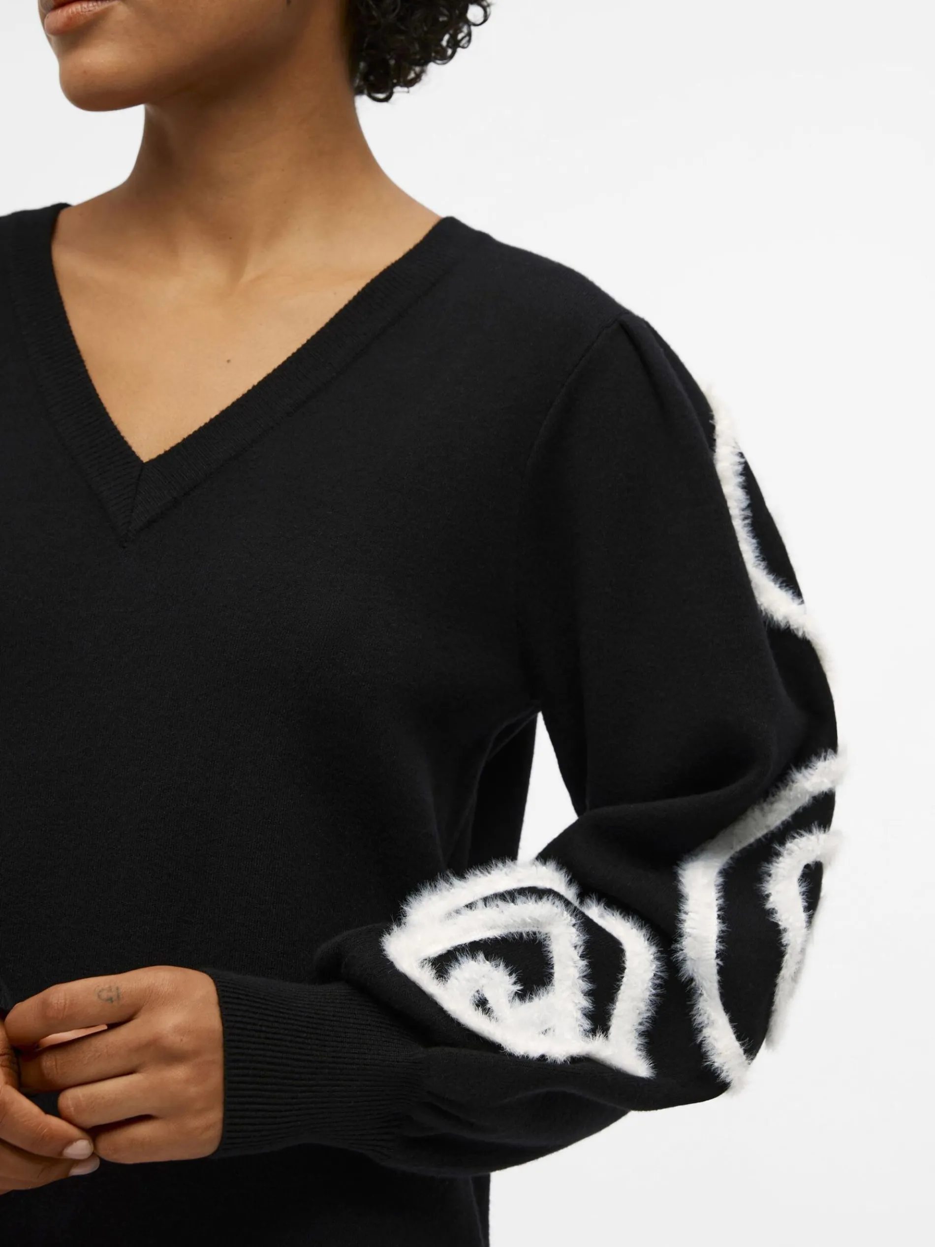 GEBORDUURD GEBREIDE JURK