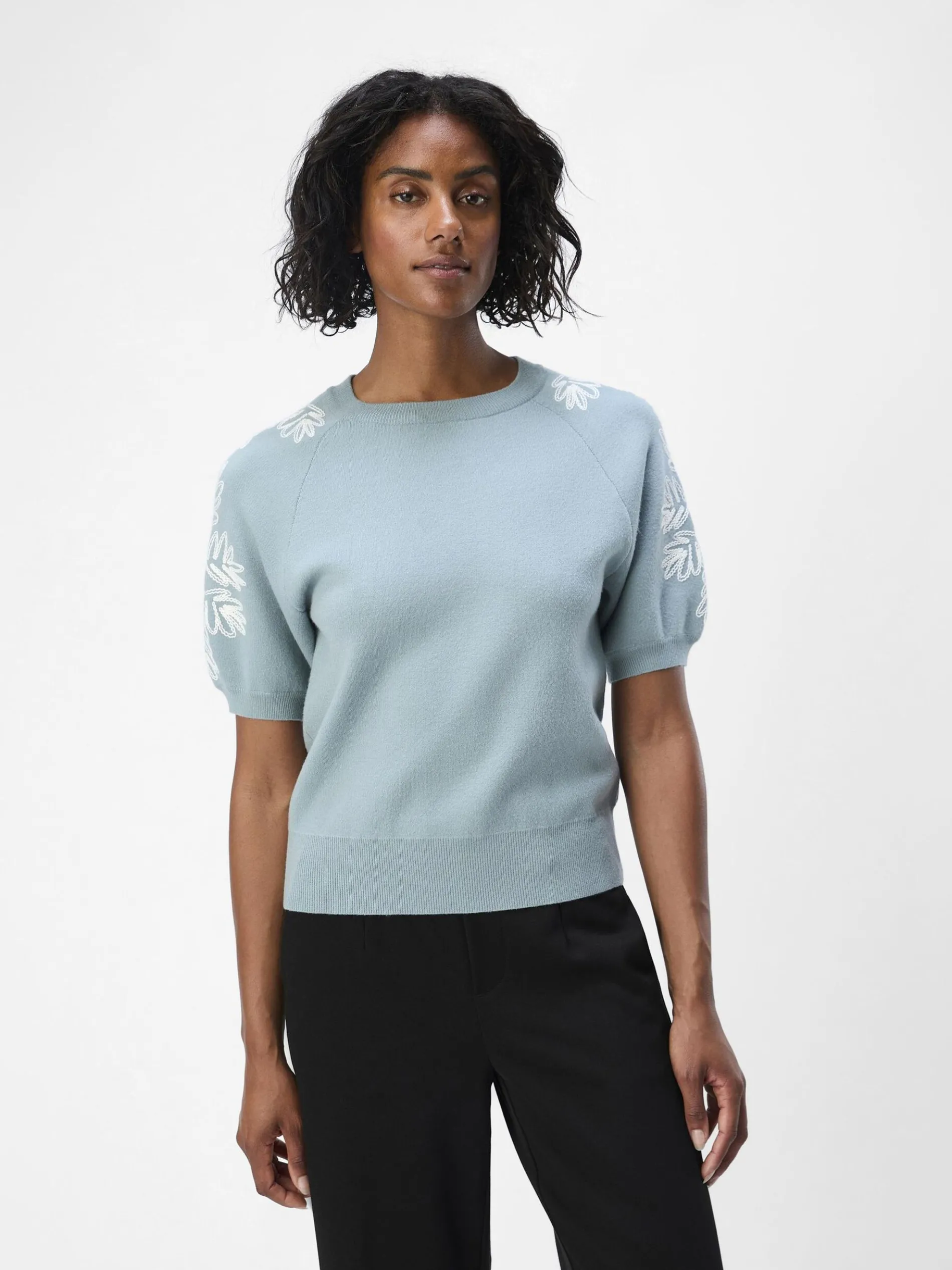 GEBORDUURD GEBREIDE TOP