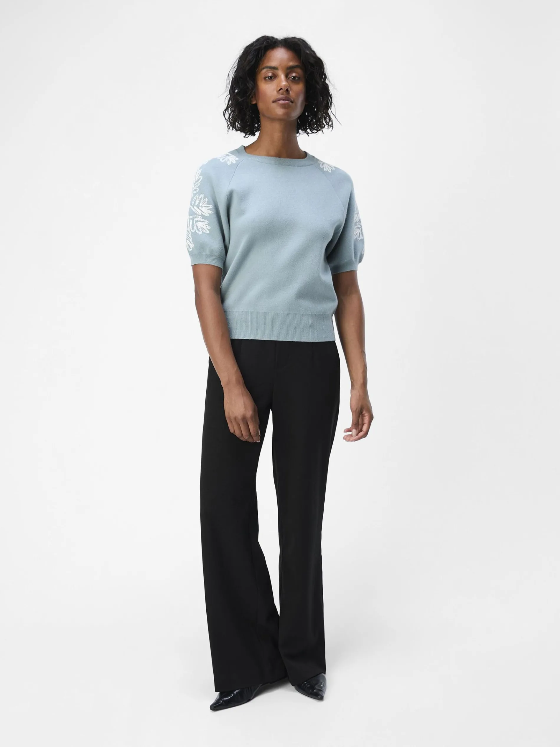 GEBORDUURD GEBREIDE TOP