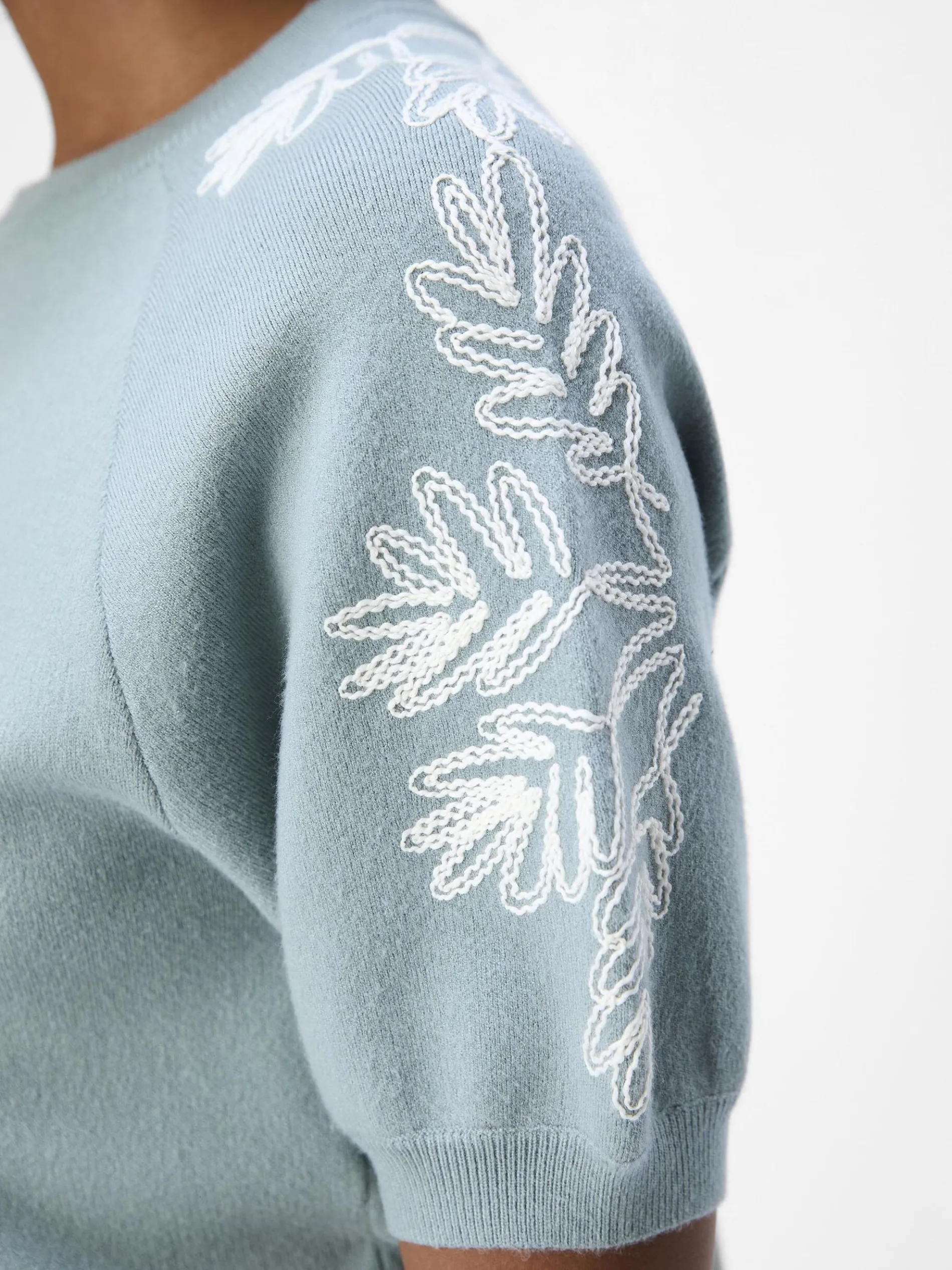 GEBORDUURD GEBREIDE TOP