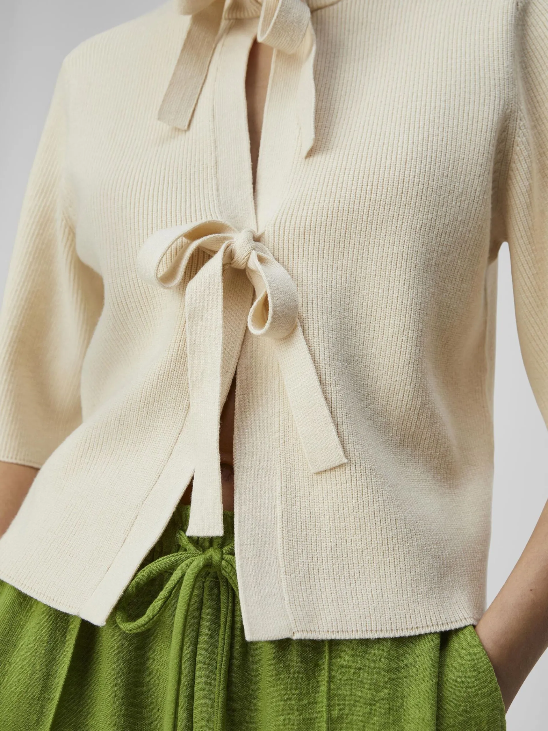 KORTE MOUWEN GEBREID VEST