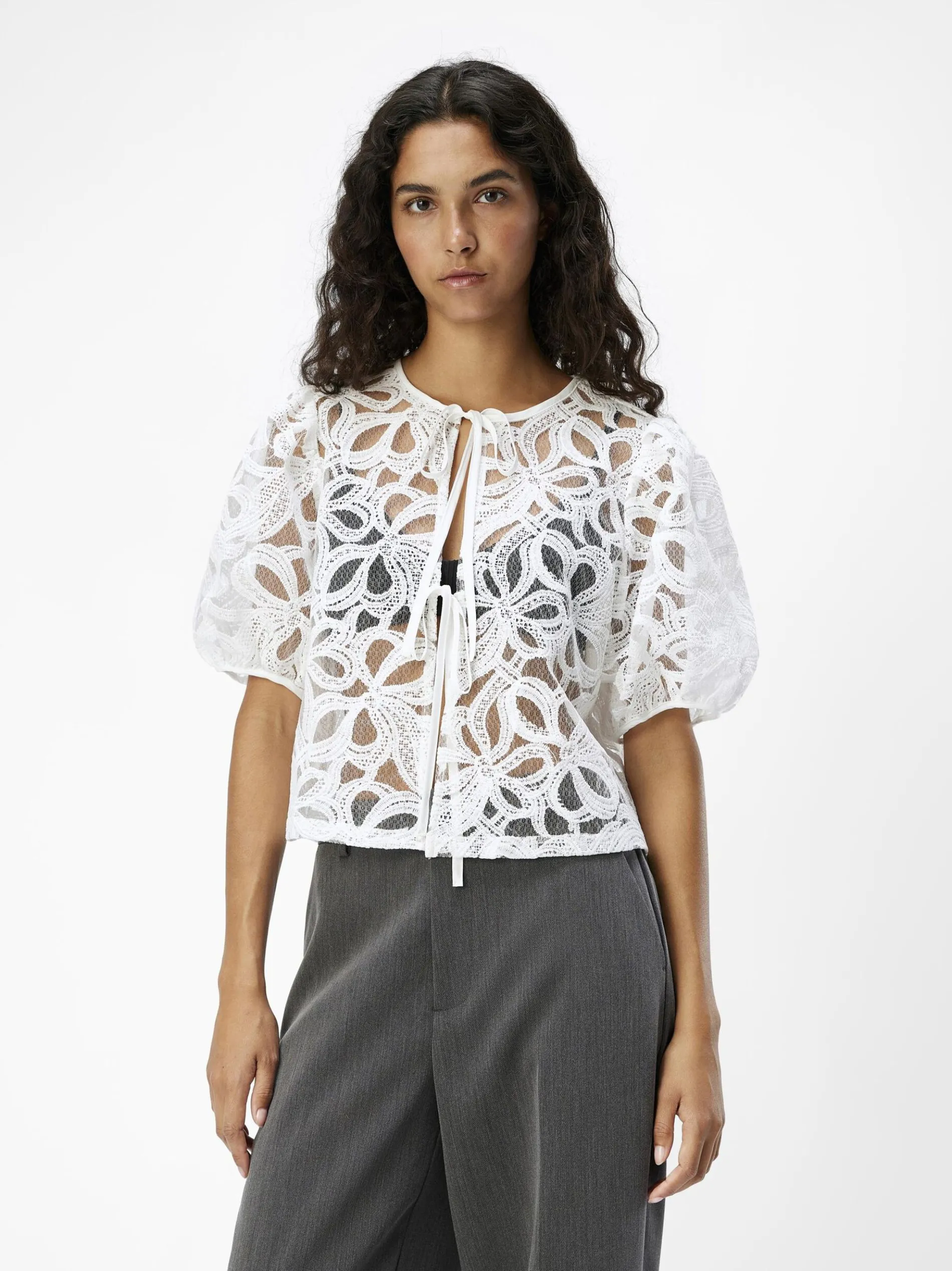 VOORKANT MET STRIKSLUITING BLOUSE